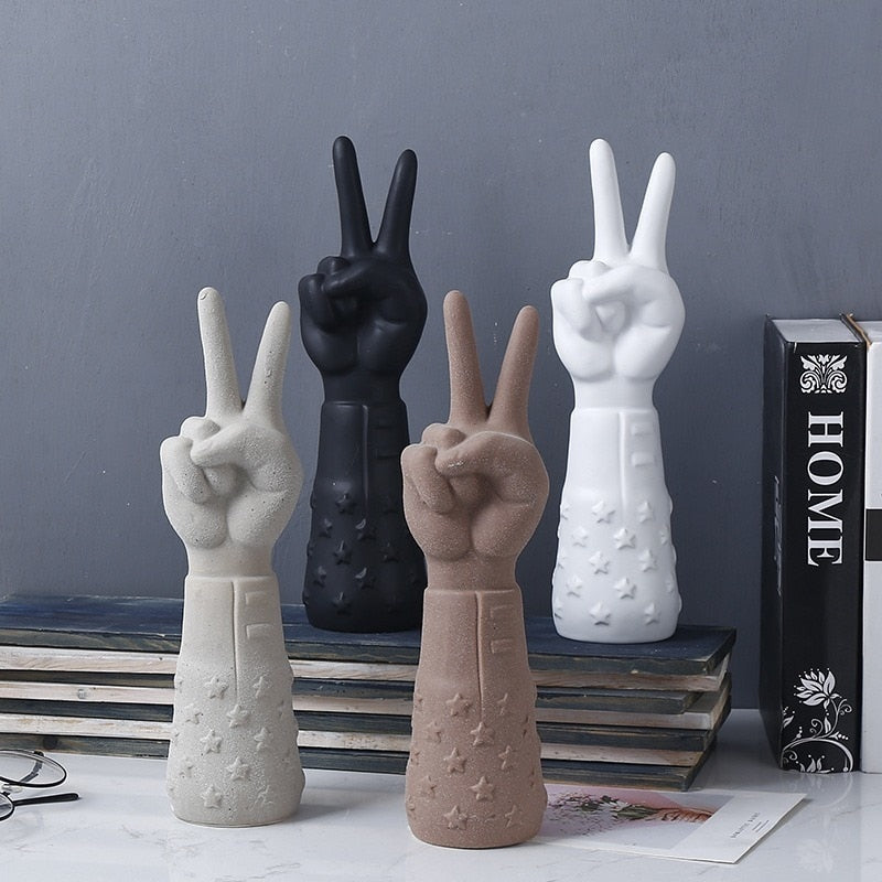 POINTING HAND STATUES