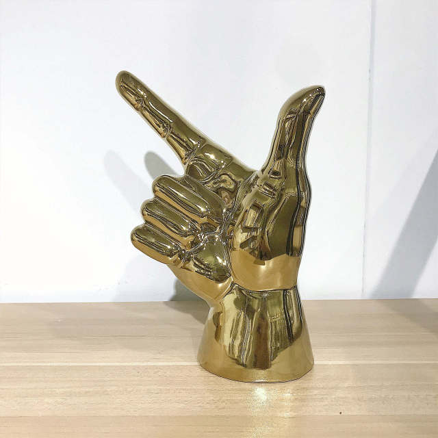 POINTING HAND STATUES