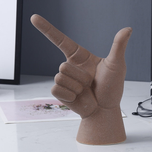 POINTING HAND STATUES