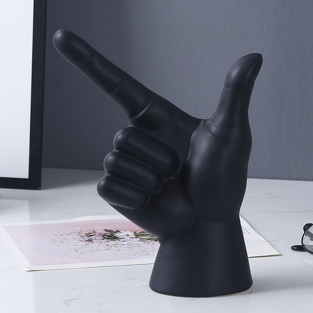 POINTING HAND STATUES