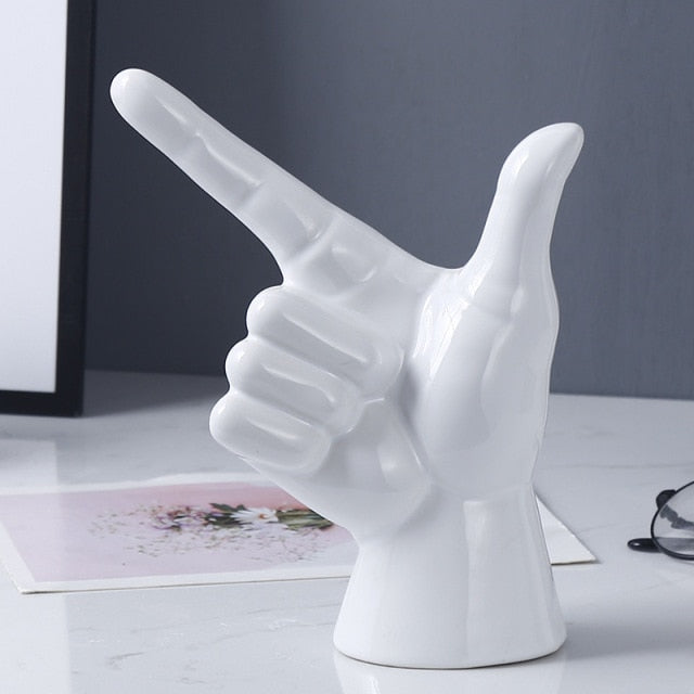 POINTING HAND STATUES