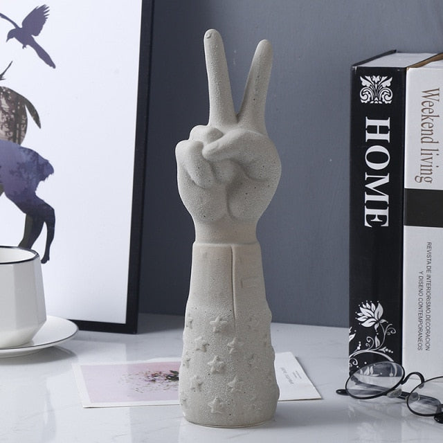 POINTING HAND STATUES