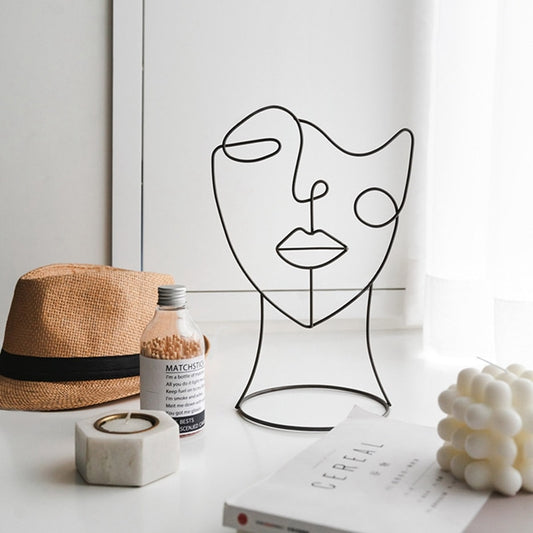 ONE LINE FACE STATUE