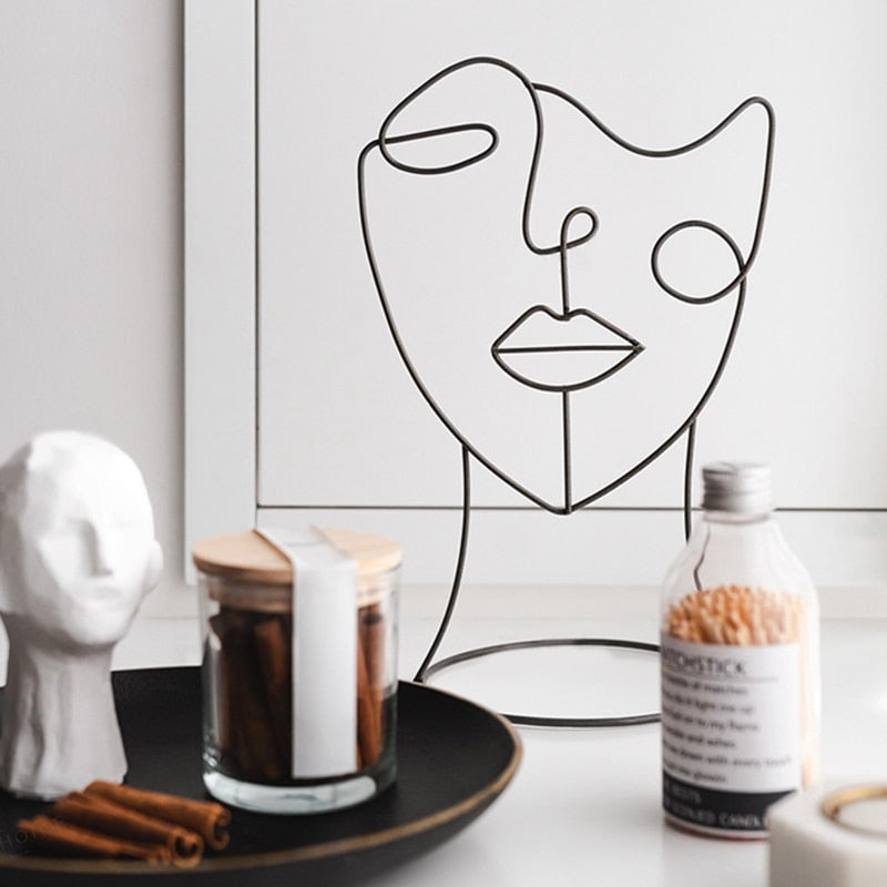 ONE LINE FACE STATUE