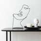 ONE LINE FACE STATUE