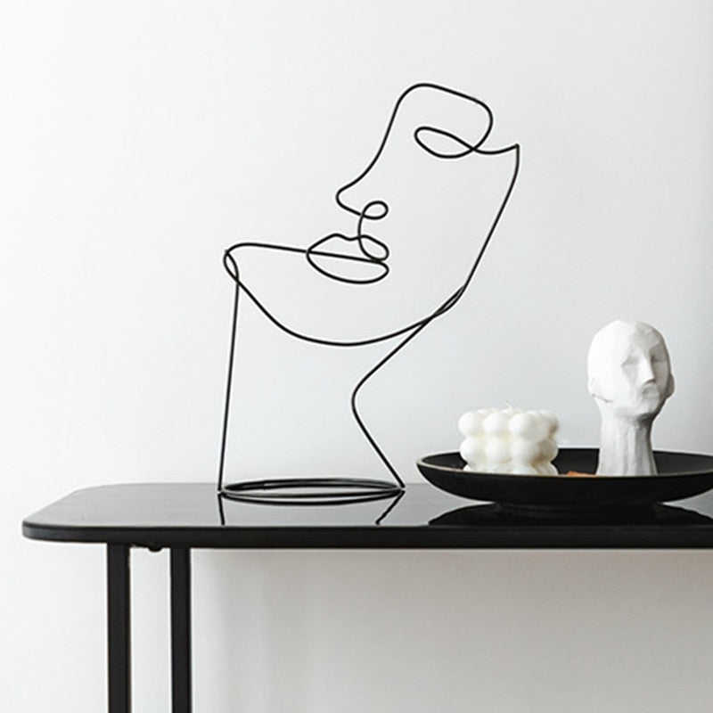 ONE LINE FACE STATUE