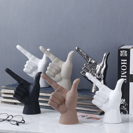 POINTING HAND STATUES